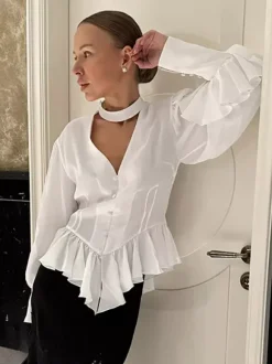 Chemisier péplum blanc élégant pour femme - Col V dos nu manches lanternes coupe ajustée - Idéal pour le printemps et le soir (2026)