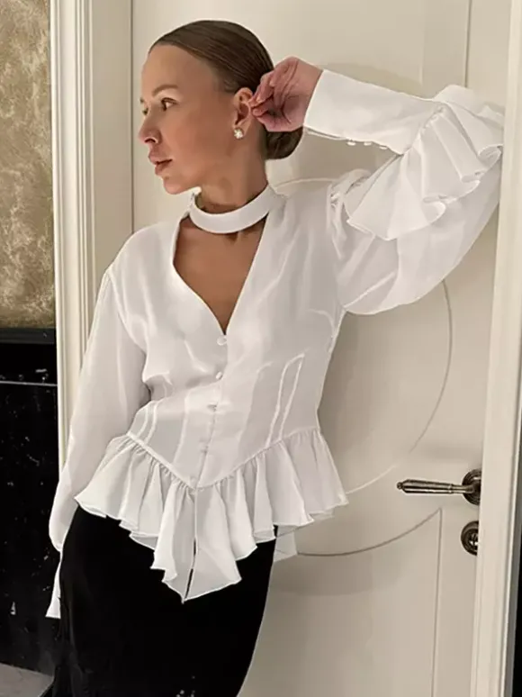 Chemisier péplum blanc élégant pour femme - Col V dos nu manches lanternes coupe ajustée - Idéal pour le printemps et le soir (2026)