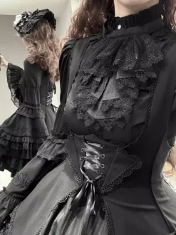 Chemisiers gothiques Lolita noirs à manches longues haut Lolita à volants et dentelle