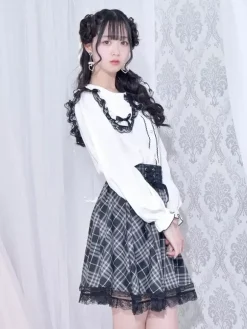 Chemisiers gothiques Lolita haut Lolita blanc à manches longues n艙uds en dentelle chemise Lolita à blocs de couleurs