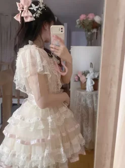 Chemisiers Lolita doux haut Lolita blanc à manches courtes n艙uds et volants chemise Lolita