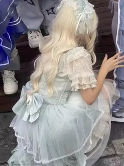 Chemisiers Lolita doux blancs à manches courtes et volants n艙uds haut Lolita en dentelle