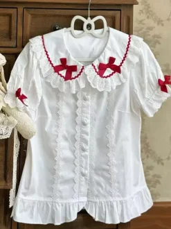 Chemisiers Lolita doux haut Lolita rose à manches courtes volants n艙uds chemise Lolita à blocs de couleurs