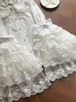 Chemisiers Lolita doux hauts Lolita blancs à manches longues et n艙uds en dentelle chemise Lolita