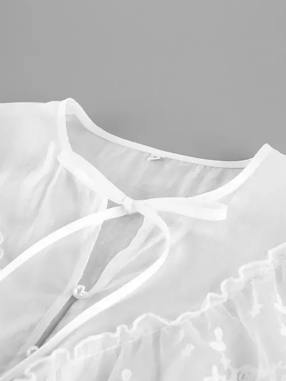 Chemisier vintage à col volanté taille élastique poignets évasés et manches longues