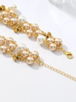 Collier ras-de-cou à perles multi-tailles avec pompon en forme de Y et chaînette d'extension ajustable