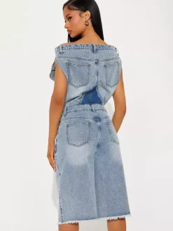 Combinaison bleue à encolure crantée sans manches en jean ample pour l'été