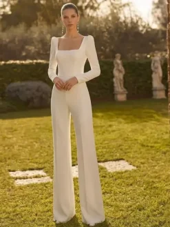 Combinaison de mariée 2 pièces en crêpe stretch avec n艙uds et traîne col carré manches longues taille naturelle couleur ivoire