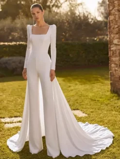 Combinaison de mariée 2 pièces en crêpe stretch avec n艙uds et traîne col carré manches longues taille naturelle couleur ivoire
