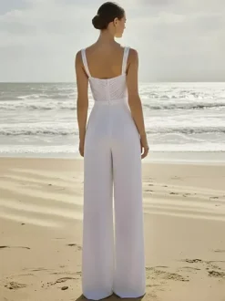 Combinaison de mariée 2 pièces en mousseline plissée avec traîne décolleté c艙ur sans manches taille naturelle couleur ivoire