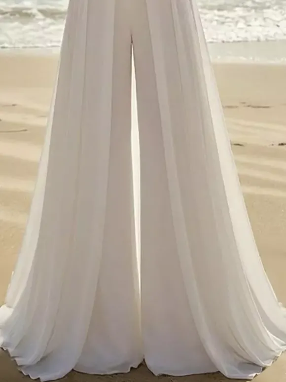 Combinaison de mariée 2 pièces en mousseline plissée avec traîne décolleté c艙ur sans manches taille naturelle couleur ivoire
