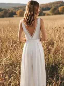 Combinaison de mariée en mousseline longue jusqu'au sol col en V sans manches taille naturelle ivoire
