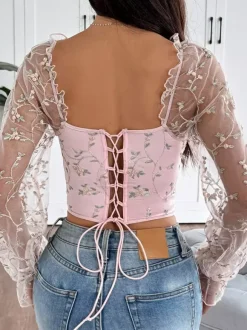 Corsets noirs chics à manches illusion manches longues bretelles col ajusté hauts transparents à lacets