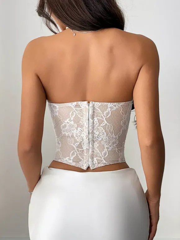 Corsets blancs sexy sans manches et sans bretelles coupe ajustée en dentelle et fermeture éclair.