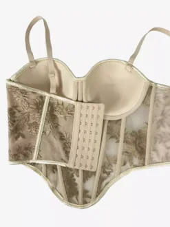 Corsets noirs sexy sans manches à bretelles coupe ajustée.