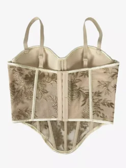 Corsets noirs sexy sans manches à bretelles coupe ajustée.