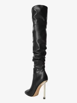 Cuissardes noires à talons hauts et bout pointu cuissardes souples