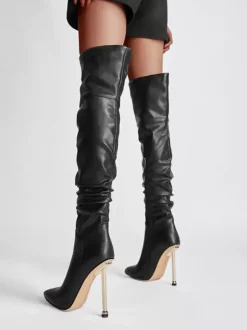 Cuissardes noires à talons hauts et bout pointu cuissardes souples