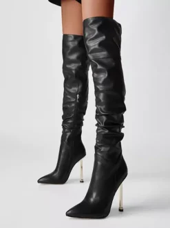 Cuissardes noires à talons hauts et bout pointu cuissardes souples