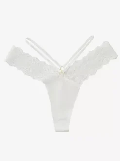 Culotte string à fines bretelles et décolleté en V ornée de dentelle