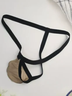 Culotte string sexy en maille rouge transparente pour homme