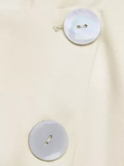 Ensemble deux pièces abricot chic à col bijou et jupe sans manches