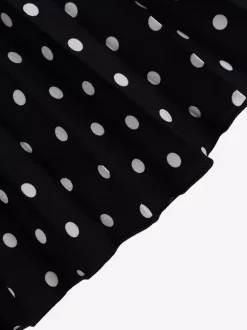 Ensemble deux pièces noir à pois style streetwear décontracté jupe à manches courtes et col rabattu