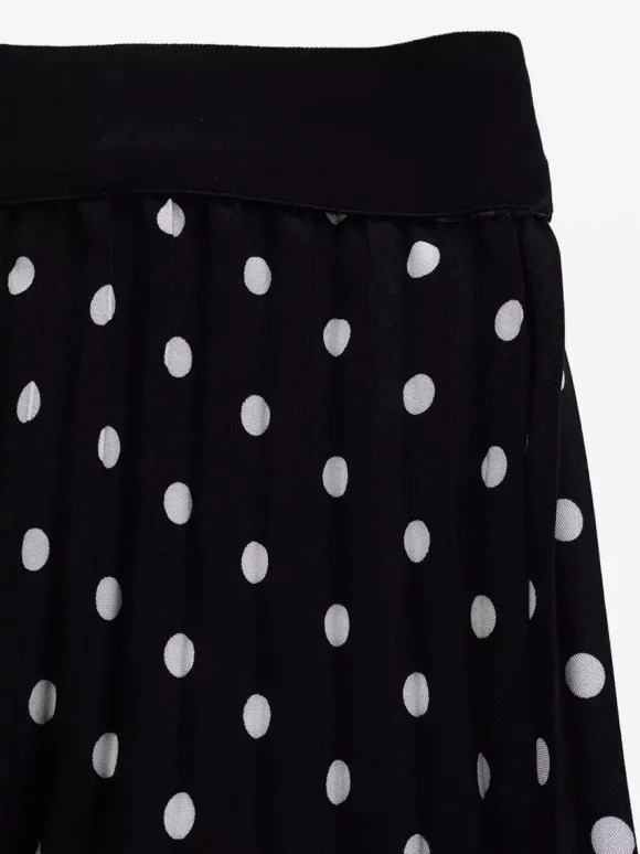 Ensemble deux pièces noir à pois style streetwear décontracté jupe à manches courtes et col rabattu