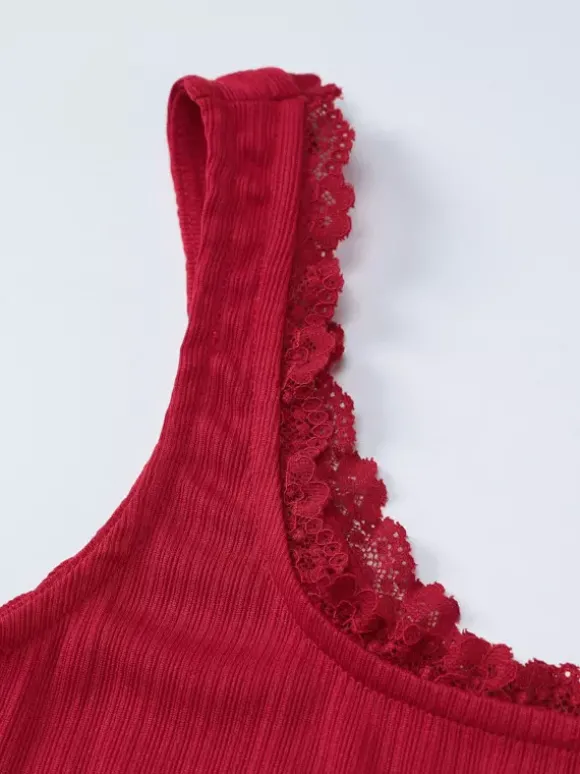 Ensemble deux pièces noir sexy en dentelle jupe sans manches à bretelles en polyester bretelles et col montant.