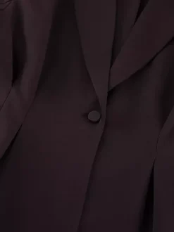 Ensemble deux pièces pour femme : blazer péplum et pantalon large marron foncé idéal pour le bureau ou les affaires.
