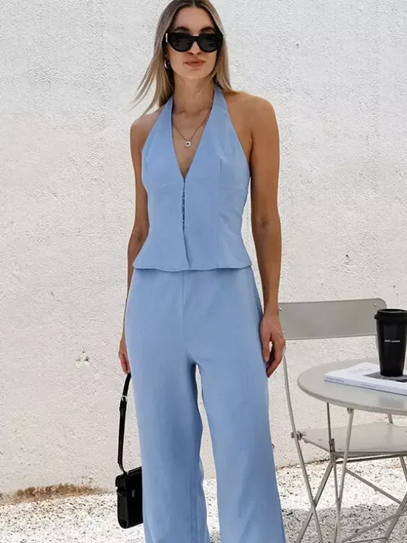 Ensemble deux pièces pour femme : débardeur court zippé à col V et pantalon large.