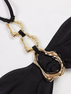 Ensemble maillot de bain et cache-maillots noirs sexy sans manches soutien-gorge dos nu et jupe longue.
