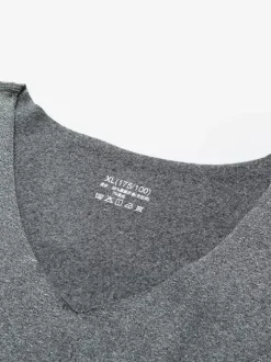 Ensemble de sous-vêtements unisexe doublé polaire coupe ajustée col en V haut et bas sans coutures.