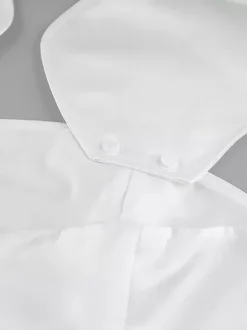 Ensemble deux pièces blanc chic en dentelle jupe sans manches sculptante style décontracté au quotidien.