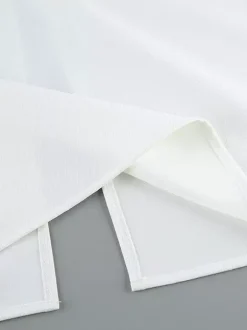Ensemble deux pièces : boutons blancs col rond chic jupe sans manches.