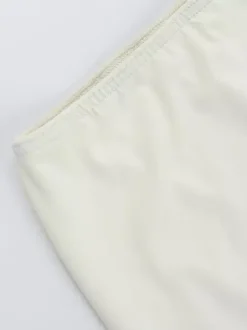 Ensemble deux pièces jaune streetwear décontracté avec jupe dos nu sans manches et découpes