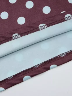 Ensemble deux pièces jupe sans manches à pois bleus style décontracté en polyester.