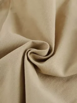 Ensemble deux pièces rose décontracté en coton et lin haut sans manches à col en V et pantalon.