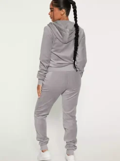 Ensemble jogging à capuche zippé en velours coupe ajustée pour femme 2026