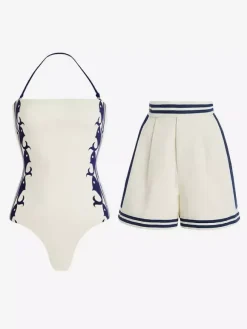 Ensemble maillot de bain deux tons rétro à lacets et dos nu avec cache-maillots et paréos.