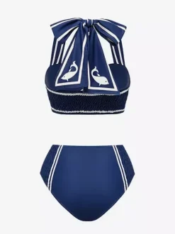 Ensemble maillot de bain deux tons bleu sexy à lacets et dos nu avec cache-maillots et paréos.