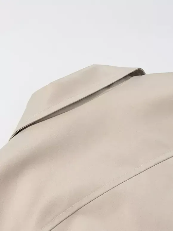 Ensemble 2 pièces : pantalon blanc plissé en polyester col rabattu manches longues.