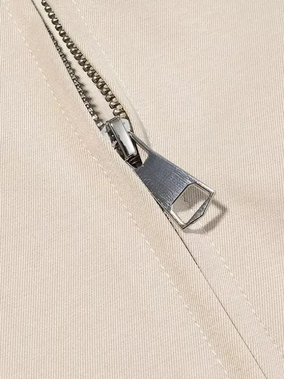 Ensemble 2 pièces : pantalon blanc plissé en polyester col rabattu manches longues.