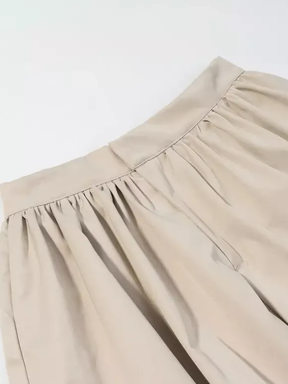 Ensemble 2 pièces : pantalon blanc plissé en polyester col rabattu manches longues.