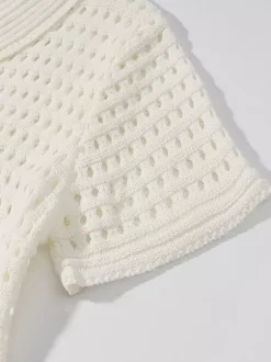 Ensemble 2 pièces pour femme : jupe blanche élégante à franges et revers manches longues.