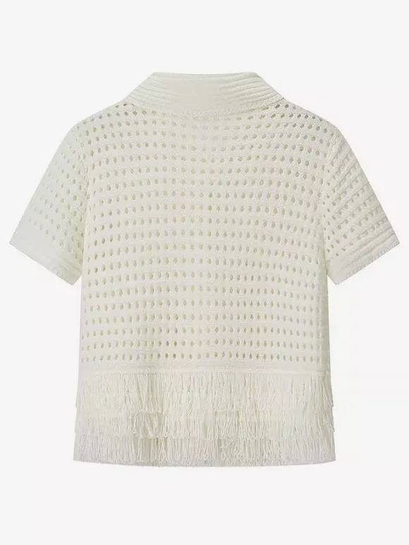 Ensemble 2 pièces pour femme : jupe blanche élégante à franges et revers manches longues.