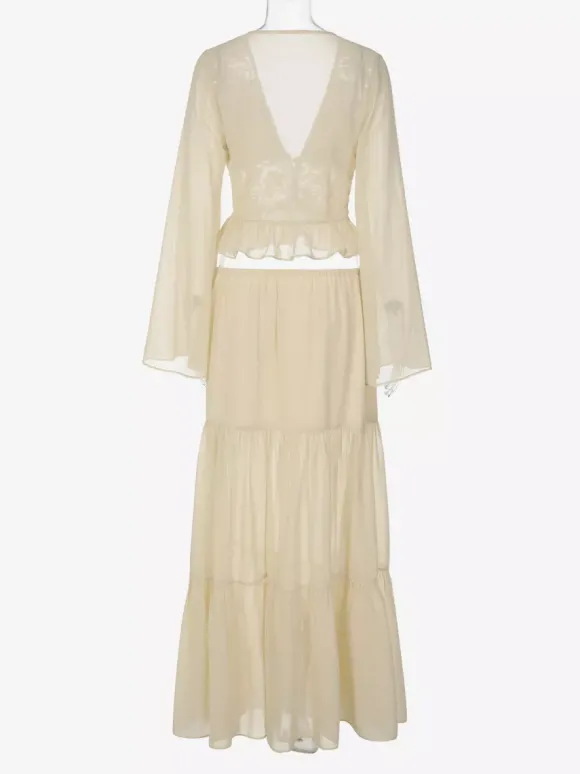 Ensembles deux pièces : jupe robe maxi couleur abricot tenue de villégiature boutons col en V manches longues.