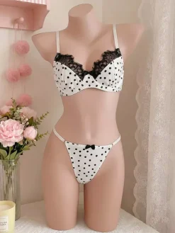Ensemble soutien-gorge et culotte blancs en dentelle à pois deux pièces.
