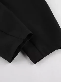 Ensemble tailleur-pantalon deux pièces blazer à manches bouffantes et pantalon large pour femme.