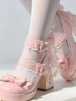 Escarpins Lolita Sweet blancs à lacets et n艙uds à l'arrière en cuir PU à talon compensé.